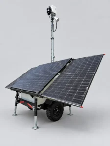 Solar-powered mobile surveillance tower used on a residential rehabilitation project